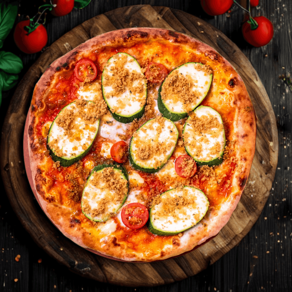 Pizza with zucchini and tomatoes